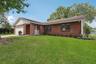 A generous .24 ACRE LOT and a thoughtfully REMODELED INTERIOR set the stage for this 4-bedroom, 2-bath home with a 2-car garage in the established Bar