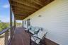 Covered balcony/deck from 2nd level-Primary and 3rd bedroom access