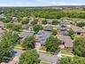 Community features a tennis court, playground, soccer field and walking path