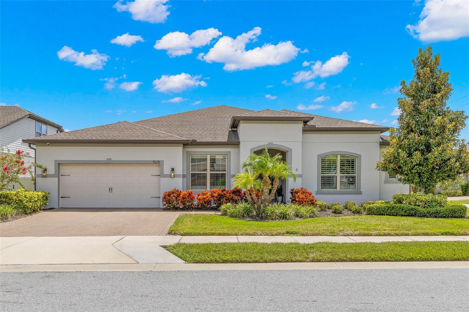 A polished first impression in gated Enclave at Palm Harbor: this single-story 3-bedroom, plus den/Flex room, 2½-bath pool home offers 2,965 square fe
