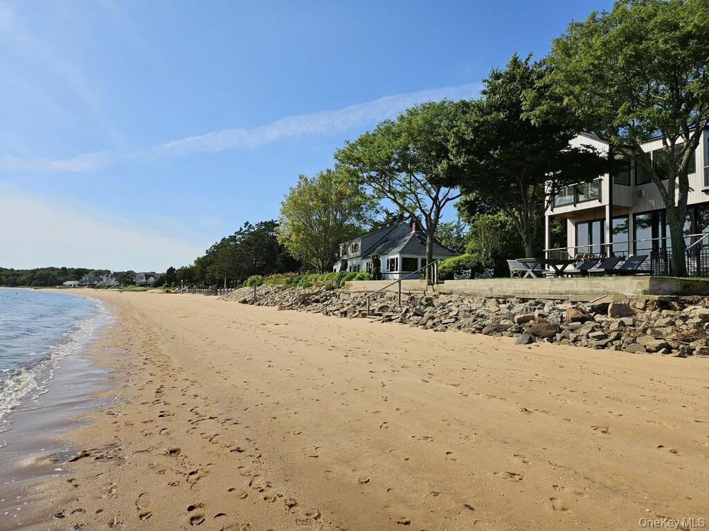 View of water feature featuring a beach view