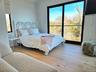 Bedroom featuring wood-type flooring