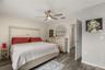 Spacious primary suite featuring abundant natural light and a private en-suite bathroom.