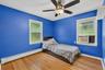 Versatile third bedroom with comfortable living space.
