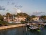 Illuminated by Early Morning Light. Tranquility. Seawall Completed in 2026. 100' of direct Intracoastal Front Serenity.