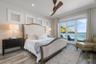 Primary Bedroom with balcony overlooking Tampa Bay and Skyway Bridge