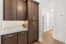 BUTLERS PANTRY TUCKED IN RIGHT BEHIND THE KITCHEN...LOTS OF STORAGE & A PREP AREA