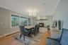 Dining room with fireplace and water view