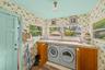 Convenient Laundry Room off Kitchen