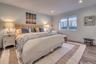 Bedroom with recessed lighting, baseboards, and wood finished floors