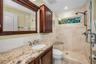 Guest Bathroom w/custom cabinetry and glass walk-in shower