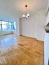 Unfurnished dining area with a chandelier and crown molding