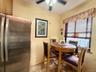 Eat in kitchen area, with large window in the corner of the building, great for ventilation