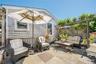 View of patio with an outdoor living space