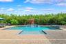 The backyard is the focal point of this property.  Oversized patio with a heated salt pool and built-in spa.