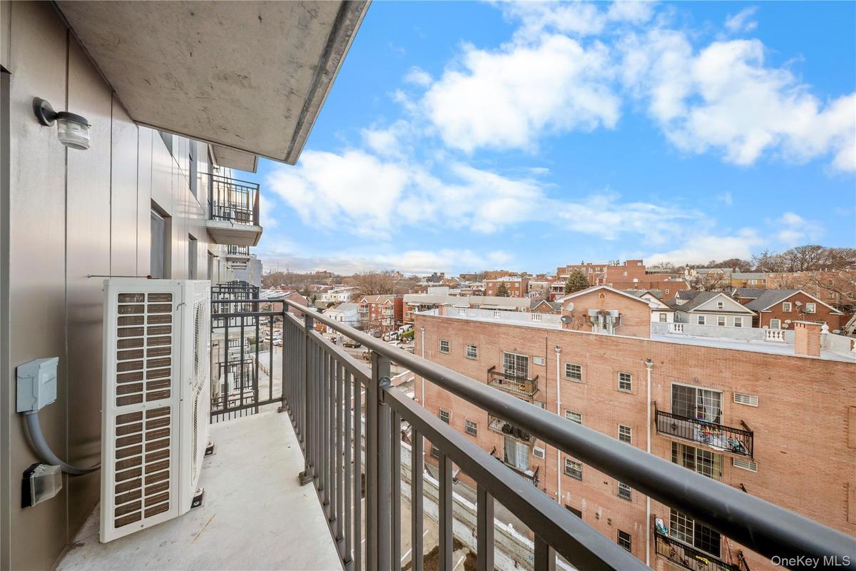 Balcony featuring a residential view