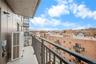 Balcony featuring a residential view