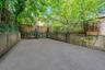 Fenced backyard featuring a patio area