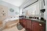 Primary bathroom with separate shower and bathtub