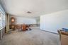 Living in the front of the home to the right of the entry foyer.