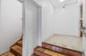 Staircase featuring a drop ceiling