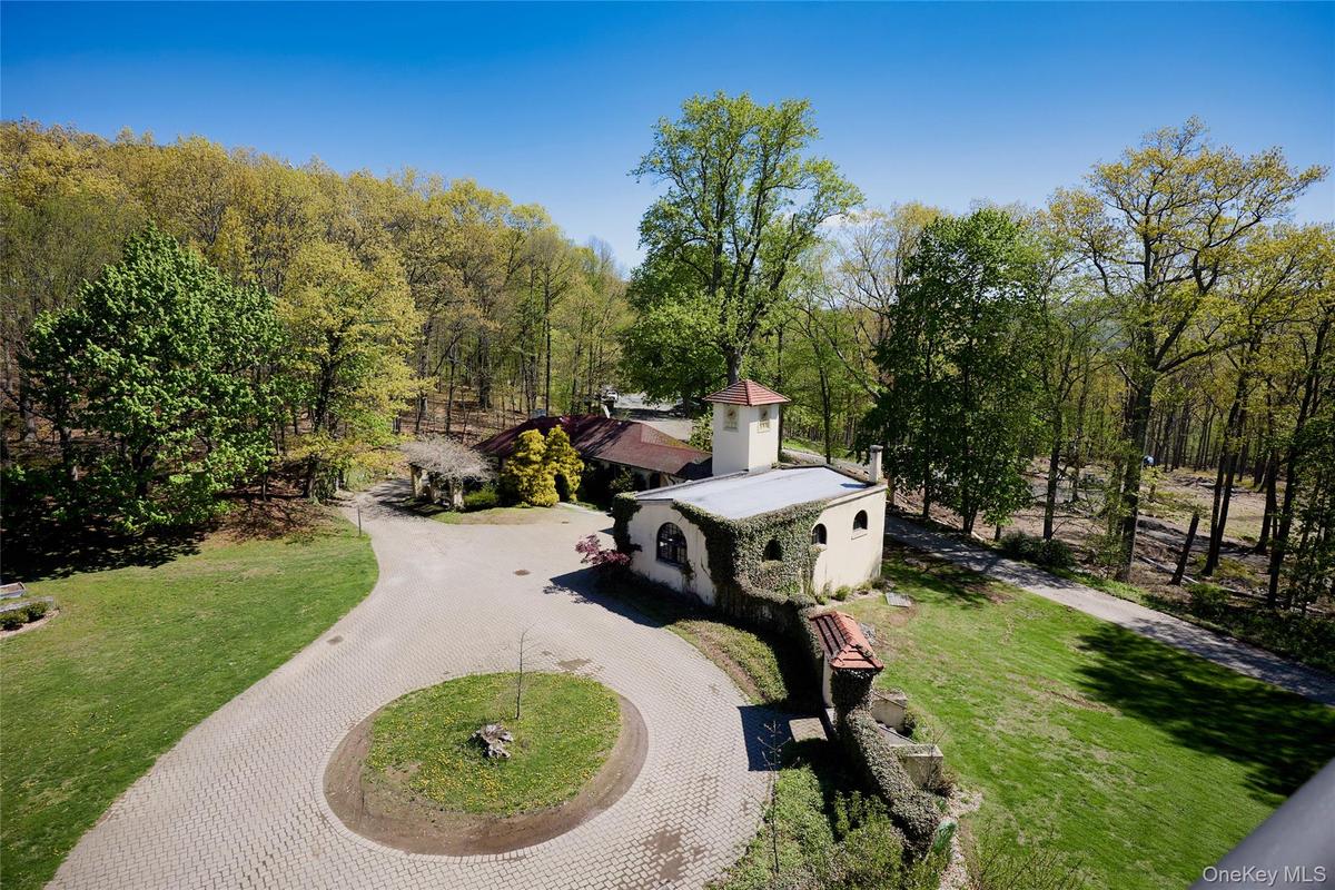 Separate guest house with Tiffany clock tower