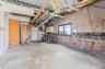 Below grade area with concrete block wall