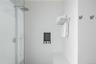 Bathroom with tiled shower