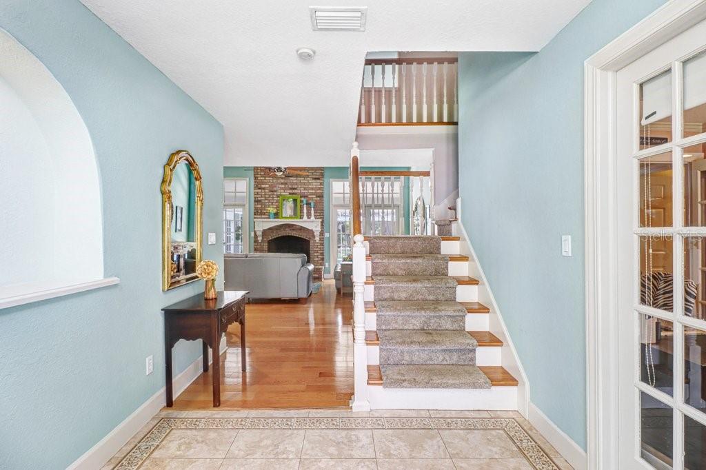 Custom Tile and Wood floors Foyer entrance