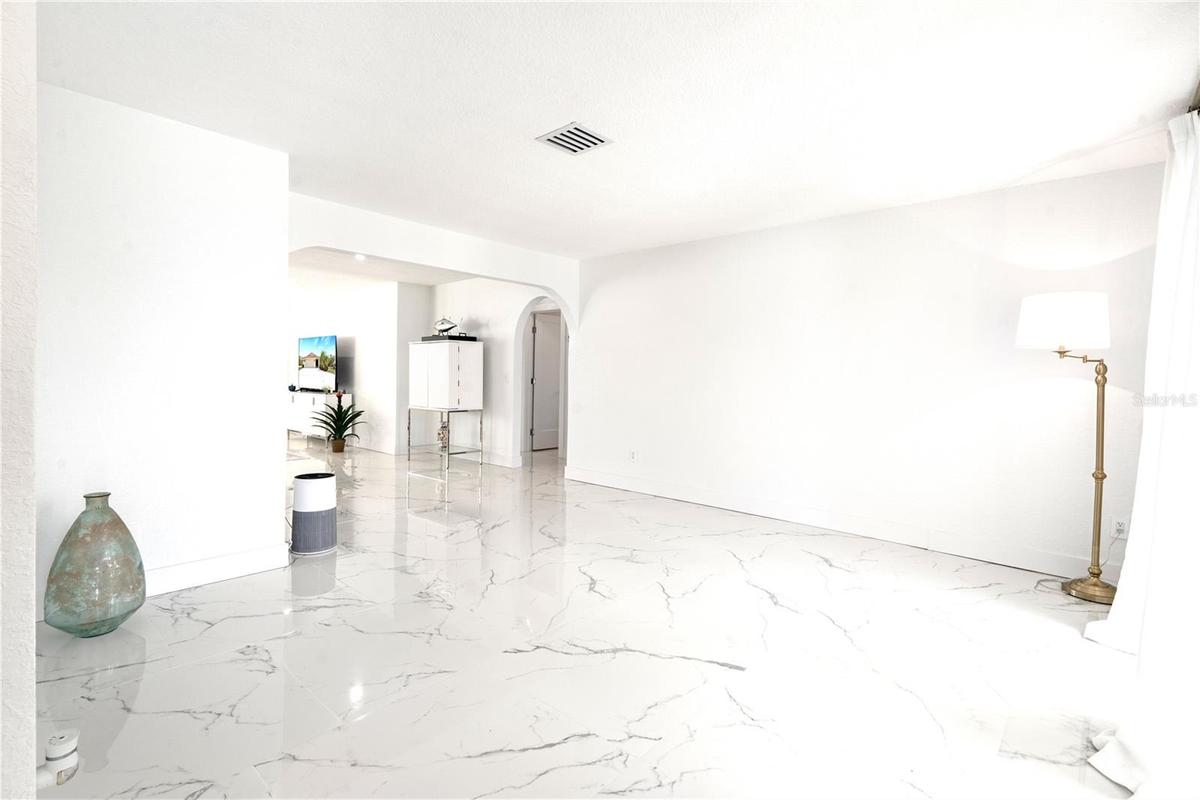Living Room, walk through to Family Room, Kitchen