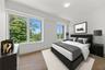 Bedroom featuring light wood-type flooring and baseboards