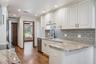 Remodeled Kitchen with Granite Countertops and Stainless Steel Appliances
