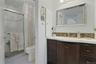 This is the Primary Bathroom and adjacent to it is a very generous size walk-in closet.