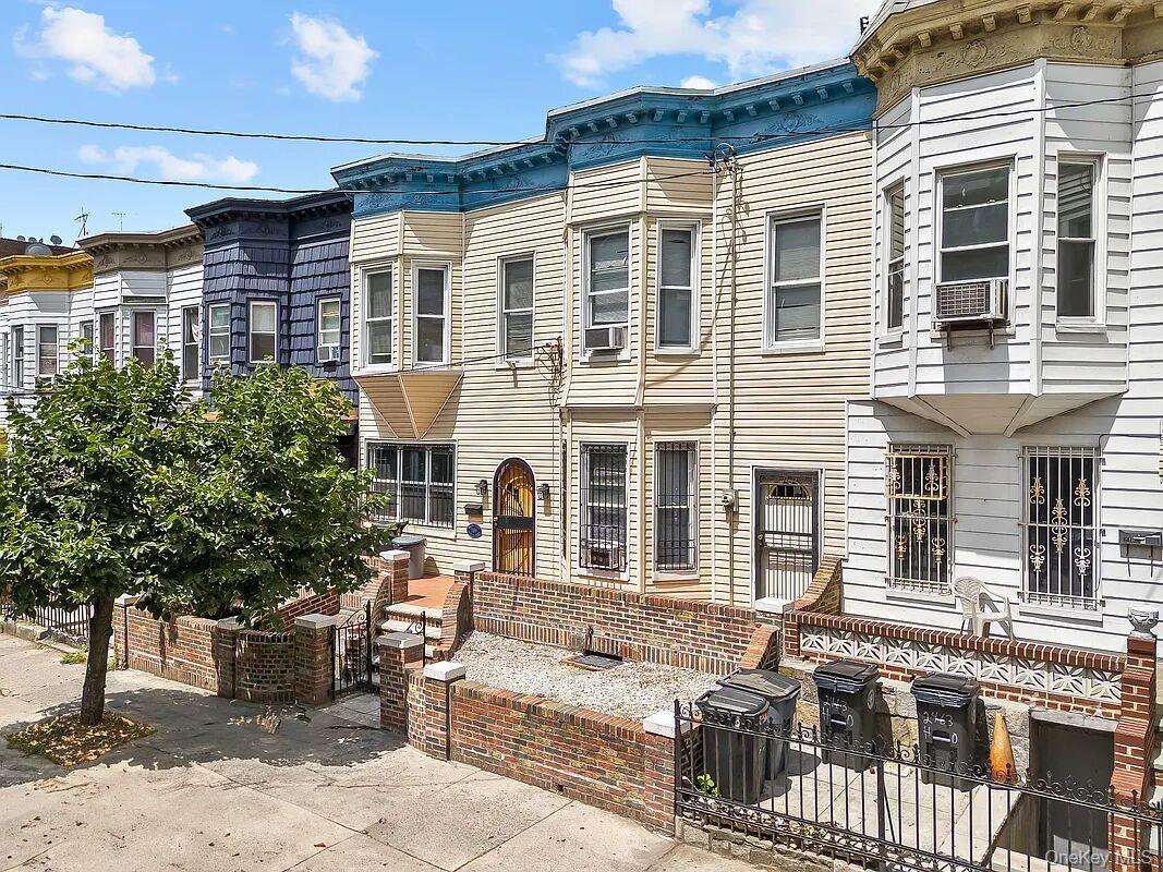 Classic Belmont Single Family attached with timeless character.