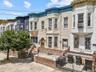 Classic Belmont Single Family attached with timeless character.