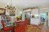 Kitchen Dining space featuring a chandelier, terracotta tile flooring, and recessed lighting
