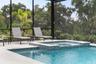 The pool cage and deck were expanded to create more space for relaxing poolside.