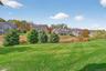 View of grassy yard featuring a residential view