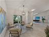 This area is staged as a sitting area. However, given its proximity to the kitchen, it would also be ideal for your dining room.