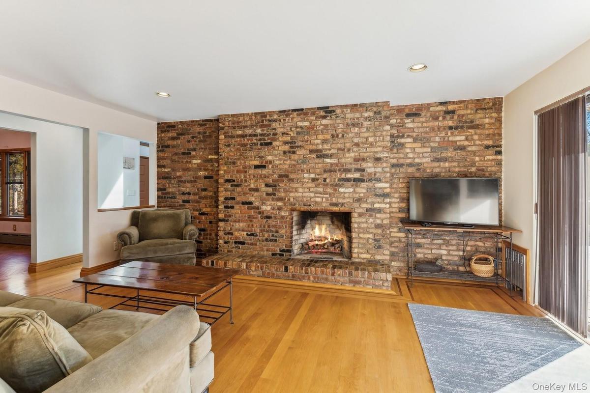 Family Room with Fireplace, Off Kitchen - Photo 2