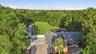 Aerial View of Main Home, Backyard & Detached Structures