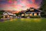 A unique property composition featuring a classic Craftsman home alongside the storied Purdy’s Station Post Office.