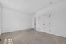 All bedrooms are spacious, with large windows, generous closet space, and wonderful potential.