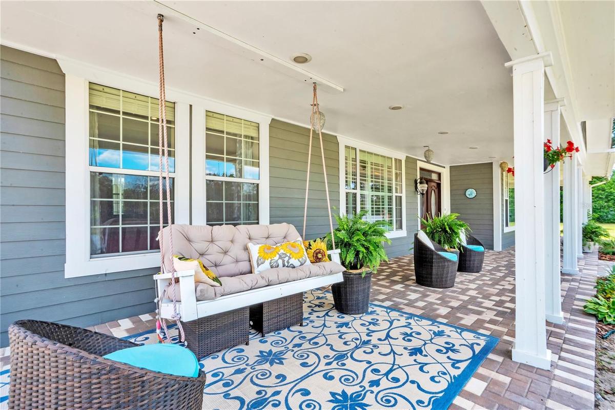 Paver, Covered Front Porch with attached swing