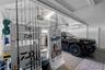 The garage has a mini-split AC, storage and epoxy flooring