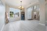Spacious dining area easily accommodates gatherings and entertaining.