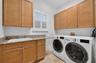 Downstairs laundry room with newer washer & dryer