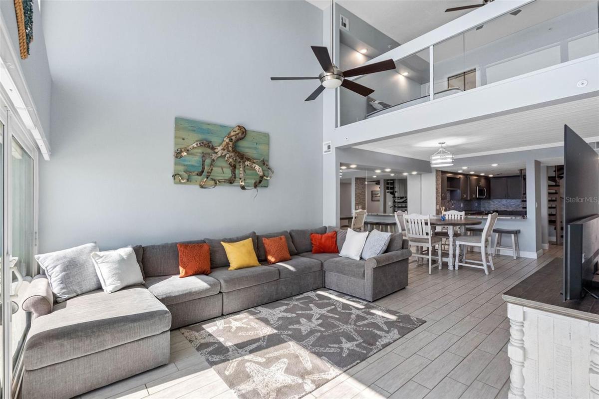 .. This Townhome Style Condo Consisits of Two Floors Offering Vaulted Ceilings with Floor to Ceiling Glass For Spectacular Water Views.
