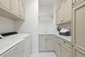 Laundry Room With Ample Cabinet Space