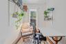 Living area with an office area and baseboards